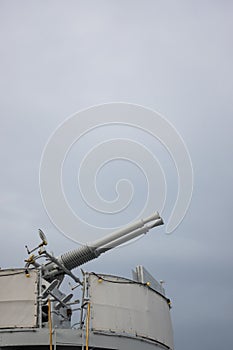 A double-barreled anti-aircraft gun on a historic warship.
