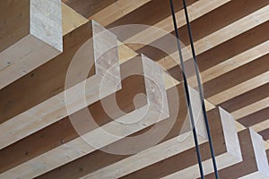 A complex multiple layered timber supported roof top construction structure