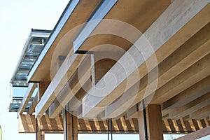 A complex multiple layered timber supported roof top construction structure