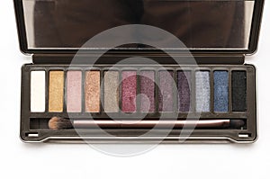 A dark brown eye shadow cosmetic palette kit photo