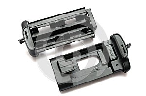 A digital single lens reflex camera vertical grip battery trays