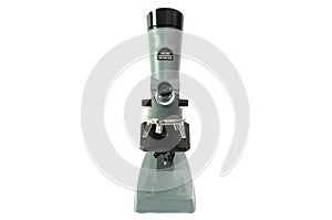 A laboratory multiple high magnification microscope toy replica against a white backdrop