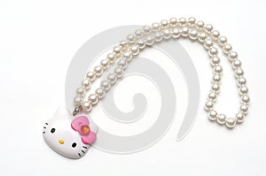 A Hello Kitty plastic toy pearl necklace