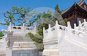 Photo taken in spring. Chinese architecture of their white marble and wood