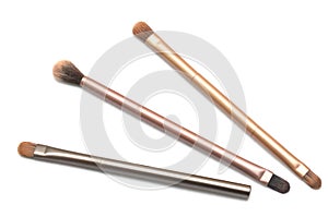 Three women cosmetic eyebrows brushes