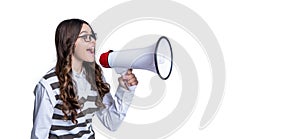 photo of teen girl announcer with megaphone, advertisement. teen girl announcer