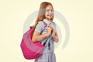 photo of teen girl with schoolbag. school education. teen girl in school uniform isolated on white