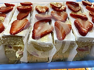 Tempting Strawberry Cakes at a Bakery