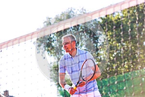 Photo of tennis net at court