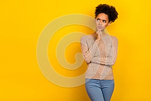 Photo of think millennial brunette lady look promo wear beige pullover isolated on yellow color background