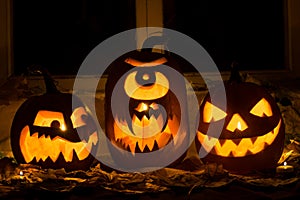 Photo of three pumpkins for Halloween.