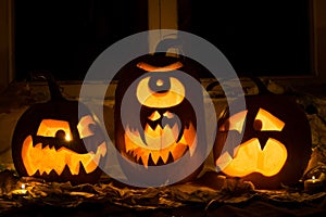 Photo of three pumpkins for Halloween.