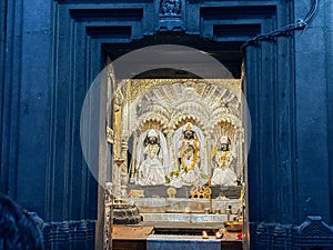 A photo of three statues of Rama, Sita and Lakhmana Hindu gods of kala Ram temple in Nashik