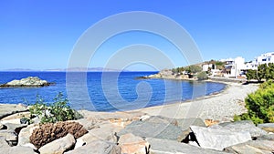 Photo of Tinos, a gorgeous Cycladic island in Greece, and its scenic harbor.