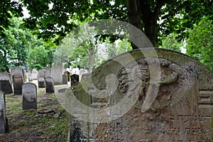 Photo of tombstones in the historic Jewish cemetery at Brady Street, Whitechapel, East London UK.