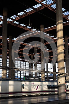 Photo of a train parked at the most important railway station in Madrid. Spain.