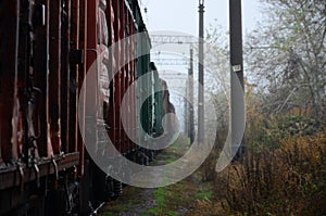 Photo of the train on rainy cloudy weather with shallow depth of fiel