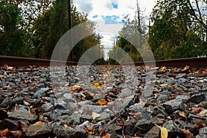 Photo from a train station's rail track when it is empty.