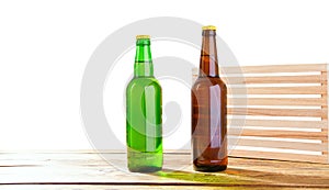 Photo of two different full beer bottles with no labels. Separate clipping path for each bottle included.2 two separate photos