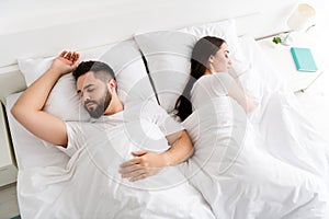 Photo of two people wife husband sleep in cozy bed in house indoors