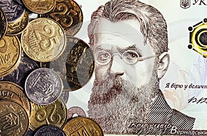 Photo of ukrainian coins laying on hrivna banknote