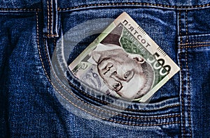 Photo of ukrainian five hindred hrivna in denim jeans pocket