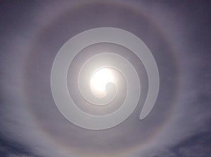 Photo of a unique natural phenomenon in the form of a luminous ring around the sun