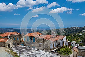 Photo of valley on Cyprus. View to the Mediterranean Sea from the hill where village Lefkara is. Cozy houses with blue shuttered