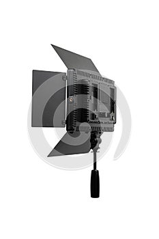 Photo and video lamp isolate on white back. LED lamp with special shutters for the formation of light flux. Photo and video