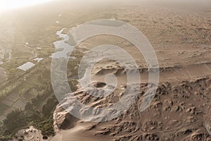 Photo of a vineyard in a desert landscape captured from above, Gansu - China