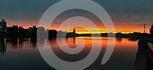 photo of water against a gradient sky