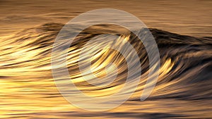 Photo of wave water textures at sunset