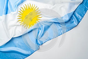 Photo of waving flag of Argentina lying on surface