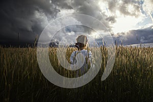 Photo of the woman in a field, double exposure