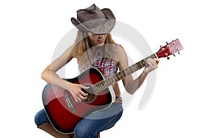 Photo of woman playing guitar
