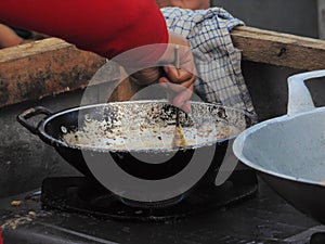 Photo of woman who made or cook telur gulung in Street Food Culinary Night