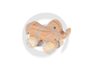 Photo of a wooden elephant on wheels of beech