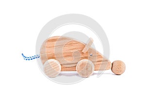 Photo of a wooden mouse on wheels of beech