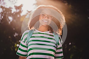 Photo of young adorable african school girl eyewear clever green trees free-time go college outdoors