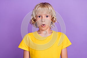 Photo of young amazed shocked astonished boy sale news reaction face isolated on purple color background