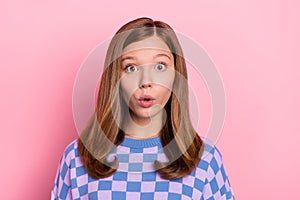 Photo of young astonished girl stupor face reaction fake information isolated over pink color background