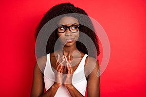 Photo of young attractive african girl think minded deep creative idea isolated over red color background