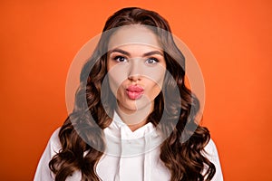 Photo of young attractive lady flirty plump lips fillers cosmetology isolated over orange color background