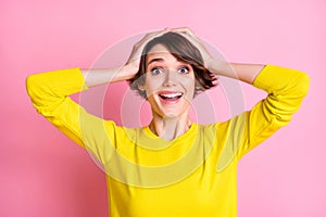 Photo of young beautiful smiling excited crazy amazed surprised girl see big sale discount isolated on pink color