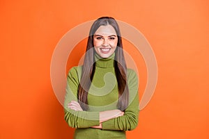 Photo of young beautiful woman happy positive smile folded hands wear casual outfit isolated over orange color