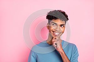 Photo of young black man happy positive smile think dream look empty space isolated over pastel color background