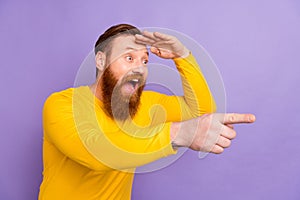 Photo of young businessman screaming direct finger empty space hand forehead funny stand up show isolated on purple