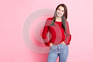 Photo of young charming girl hands pockets toothy shiny smiling wear red pullover jeans isolated pink color background