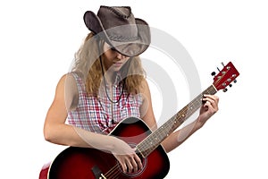 Photo of young cowgirl with the guitar