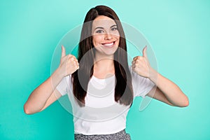 Photo of young excited girl happy positive smile show thumb-up like cool advert advice fine isolated over teal color